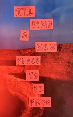 an advertisement for a new place to be from on the side of a mountain with post it notes