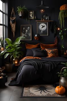 a bedroom with black walls and lots of plants