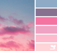 the sky is pink and blue with some clouds in it, as well as other colors