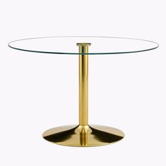 a round glass table with gold colored metal base and an oval glass top, viewed from the side