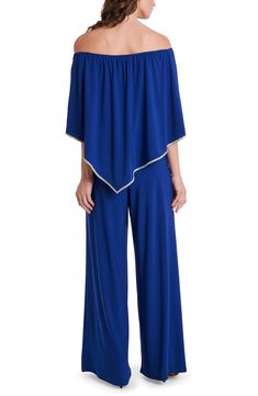 Turn heads in this shoulder-baring jumpsuit styled with a sparkle-trimmed overlay and elongating wide legs. Off-the-shoulder neck Three-quarter sleeves Unlined 96% polyester, 4% spandex Hand wash, line dry Imported Blue Strapless Jumpsuit For Spring Evening, Blue Strapless Jumpsuit For Evening In Spring, Off The Shoulder Jumpsuit, Jumpsuit Fashion, Wide Legs, Black Jumpsuit, Three Quarter Sleeves, Quarter Sleeve, Three Quarter