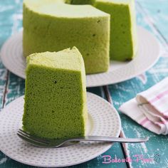 there is a green cake on the plate