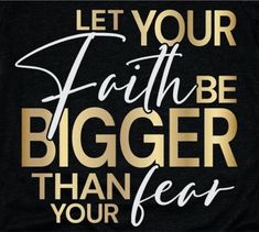 a black t - shirt with gold lettering that says let your faith be bigger than your fear