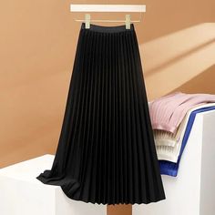 Elegant Long Pleated Skirt Women Spring Autumn Solid Elastic Waist A-line Slim Luxury Midi Skirt Vintage Female SPECIFICATIONS Waistline: empire Style: basics Silhouette: A-LINE Material: POLYESTER Elasticity: Slight Strech Dresses Length: Mid-Calf Season: Autumn/Winter Gender: WOMEN Fabric Type: blended 1Measurement In CM size Waist(cm) Length(cm) S 58-78 77 M 62-88 78 L 66-92 79 XL 70-96 80 Notes:Please consult the customer service staff before purchase.Order size is Asian Size , It is smaller than US,UK,AU,EU size.please tell us your height and weight,we will suggest you the correct size.1,We mainly operate dress,Welcome to choose and buy.2,The real color of the item may be slightly different from the pictures shown on website,caused by many factors such as brightness of your monitor an Fall Stretch A-line Pleated Skirt, Non-stretch Solid Color Flared Pleated Skirt, Non-stretch Pleated Flared Skirt, Solid Non-stretch Pleated Skirt, Solid Color A-line Pleated Skirt For Fall, Solid A-line Pleated Skirt For Fall, Non-stretch A-line Skirt In Solid Color, Leisure Wear Women, Stylish Dresses For Women