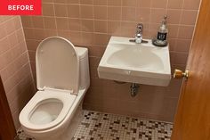 a white toilet sitting next to a bathroom sink under a faucet mounted on a wall