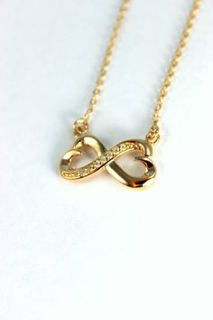 Gold Filled Infinity Necklace $35.00 by divinitycollection Gold Necklace For Valentine's Day Party, Gold Jewelry For Mother's Day Party, Mother's Day Party Gold Jewelry, Elegant Chain Necklaces For Mother's Day, Gold Necklace For Wedding, 16 Inch Length, Elegant Chain Jewelry For Mother's Day, Elegant Mother's Day Jewelry With Chain Detail, Gold Necklace With Adjustable Chain For Anniversary, Gold Jewelry With Delicate Chain For Anniversary