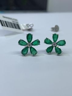 Metal...........14k white gold ( pure gold)Flower design Handmade in USA Emerald weight......2.20CT( set )Diamond weight.......0.8CTNatural clean stoneEarring Width ........11.2mmPush back Earrings Prong setting Diamond Flower-shaped Gemstone Earrings, Fine Jewelry White Gold Flower-shaped Diamond Earrings, White Gold Flower Shaped Diamond Earrings, Fine Jewelry, White Gold Sterling Silver Flower Earrings, White Gold Flower Shape Diamond Earrings, White Gold Flower Shaped Diamond Earrings, White Gold Emerald Fine Jewelry Earrings, White Gold Flower-shaped Diamond Earrings, Sterling Silver Flower-shaped Earrings With Brilliant Cut