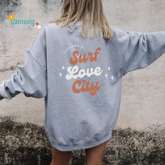 Surf Love City Sweatshirts, Beach / Surfing sweatshirts, Trendy Aesthetic Sweatshirts, Oversized Adult Unisex Crewneck Thank you for stopping by at izummy design & art. 🌼SIZING🌼 Sweaters and hoodies come in Unisex Small to 3X-Large. These unisex sweaters and hoodies are intended to fit loose & oversized for women to give a chic and layback vibe🤍 Please choose your usual size for a relaxed fit and if you want something to be more fitting, we would recommend a size down! 🌷MATERIAL🌷 - 50% Cotton 50% Polyester - Medium-heavy fabric - Ribbed knit collar - No itchy side seams ✈️FULFILLMENT & SHIPPING✈️ The average time for fulfillment will be 2-4 business days but can be up to 7 business days during busy periods. Shipping in the US: 2-4 business days after fulfillment time Shipping in Canad Sweatshirts Oversized, Beach Surfing, California Surf, Laughing And Crying, Trendy Aesthetic, Crescent City, Make You Smile, The Dreamers, San Jose