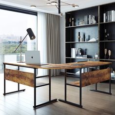 a desk with a laptop on it in front of a window