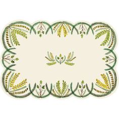 a green and white placemat with leaves on it's border, in the shape of a rectangle