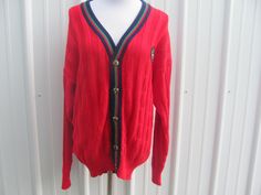 Vintage 90s bright red cable knit oversized cardigan sweater. Button closure. Tag size medium, but please go by measurements as it runs a little bigger/oversized. Tag brand Ferrioni Collection and on the chest there is a logo patch with a little Scotty dog. In good vintage condition, with exception of a couple very small snags. Super soft!  MEASUREMENTS (laying flat) - CHEST approx 23 inches underarm to underarm  LENGTH approx 30 inches shoulder to bottom hem  SLEEVES approx 24 inches underarm t Scottish Dog, Retro Cardigan, Retro Cardigans, Scotty Dog, Dog Patch, Oversized Sweater Cardigan, Cable Knit Sweater Cardigan, Oversized Knit Cardigan, Knit Cardigan Sweater