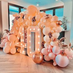 balloons are arranged in the shape of letters and numbers