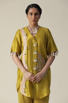 Green tunic featuring side patchwork pattern, embellished by beads, mirror, tassels and embroidered mandala motifs. Comes with striped pant. - Aza Fashions Embroidered Chanderi V-neck Sets, Designer Embroidered V-neck Set, Embroidered V-neck Set For Designer Wear, Embroidered V-neck Traditional Wear For Festivals, Navratri Embroidered V-neck Dupatta, Traditional Wear With Mirror Work And V-neck, Traditional V-neck Wear With Mirror Work, Traditional V-neck With Mirror Work, Festive Embroidered V-neck Kurta