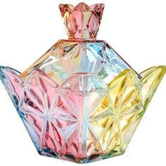 an image of a colorful perfume bottle on a white background