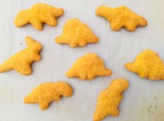 several cookies shaped like animals on a table