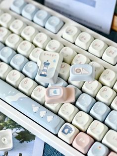 a computer keyboard sitting on top of a table