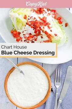 blue cheese dressing with lettuce and tomatoes in a bowl next to a fork