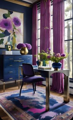 a dining room with purple curtains and blue chairs in front of a painting on the wall