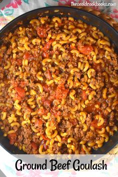 ground beef goulash in a skillet with the words ground beef goulash above it