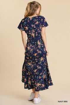 This feminine floral maxi dress is your ticket to a magical summer escape. Its breezy wrap silhouette and ruffle sleeves channel carefree boho vibes, while the vibrant floral print summons visions of sunny meadows and fragrant blooms. Made of a lightweight [poly] blend, it's perfect for balmy days and steamy nights. Whether you're dancing barefoot at an outdoor music festival or strolling the beach at sunset, this whimsical wonder will make every moment feel like an adventure. Pair it with strap Flowy Floral Print Maxi Dress With Short Sleeves, Blue Ditsy Floral Print Maxi Dress For Garden Party, Spring Vacation Maxi Dress With Surplice Neckline, Spring Rayon Wrap Dress With Surplice Neckline, Spring Surplice Neckline Rayon Wrap Dress, Flowy Maxi Length Floral Dress, Flowy Maxi Dress With Surplice Neckline For Vacation, Casual Summer Floral Print Wrap Dress, Casual Summer Floral Wrap Dress