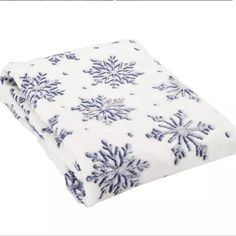 Double Sided- Reversible Comfortable And Warm, This Plush Throw Is The Perfect Way To Cozy Up During The Winter Season. Featuring A Seasonal Snowflake Pattern On A White Background Along With A Plush Velvet Feel, This Throw Is The Perfect Blanket For Taking A Midday Nap Or Warming Up When It's Chilly Out. Product Dimensions: 50.0"L X 60.0"W Product Weight: 1.26 Lb Material: 100% Polyester Care & Cleaning: Machine Wash Cold. Tumble Dry Low. Do Not Bleach, Iron Or Dry Clean Features Holiday-Themed Brr Basket, Snowflake Blanket, Holiday Blankets, Winter Blanket, Holiday Movies, Velvet Texture, Winter Blankets, Blue Snowflakes, Blue Blanket