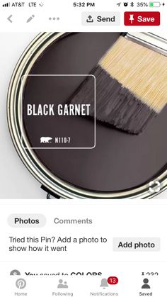 a black and white paint can with the words black garnet on it next to an image of a brush