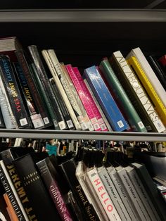 a book shelf filled with lots of books on top of eachother's shelves