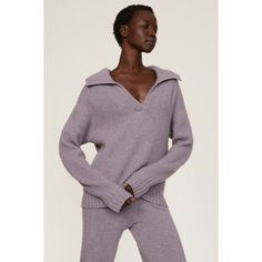 Purple knit (70% Wool, 30% Cashmere). Top. Long sleeves. V-neck. Pull on. 22" from shoulder to hemline. Imported. V-neck Tops With Seamless Collar For Work, V-neck Sweater With Seamless Collar For Work, V-neck Tops With Ribbed Collar For Work, Casual V-neck Sweater With Seamless Collar, Oversized V-neck Tops With Ribbed Cuffs, Spring V-neck Knit Top With Seamless Collar, Spring V-neck Seamless Collar Knit Top, V-neck Loungewear Top With Ribbed Cuffs, V-neck Top With Ribbed Cuffs For Loungewear