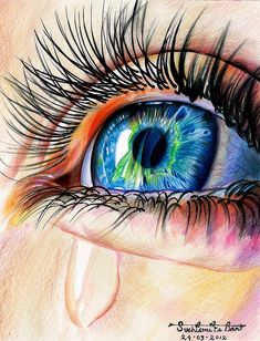 an eye with colored pencils on the iris's blue and green eyeshade