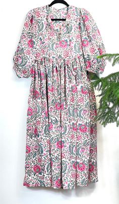 Indian Blockprint Pure Cotton Everyday Midi Dress Summer Earthy Elegant Comfy wear Beach Outfit Daily Wear Cotton Dress Bomull Lång Klänning This elegant pur cotton Blockprint ankle length dress is going to be your all time favourite dress! Pure cotton is most gentle on skin and easy to care . Its used Azo free dyes to make it more eco friendly. It has a pocket for your essentials. Its relaxed balloon sleeves .makes it so beautiful and comfortable. Handmade cotton strings around the neck adds gi Bohemian Floral Print Holiday Dress, Floral Print Long Sleeve Maxi Dress For Holiday, Long Sleeve Floral Print Maxi Dress For Holiday, Floral Print Maxi Dress For Holiday, Printed Floral Dress For Vacation, Printed Sundress For Holiday, White Floral Print Maxi Dress For Holiday, Long Sleeve Floral Print Holiday Dress, Summer Smock Dress With Short Sleeves