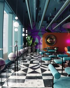 the interior of a modern restaurant with checkered flooring and blue chairs, tables and lamps