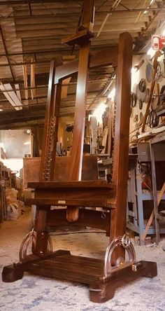 an old wooden chair sitting in a room