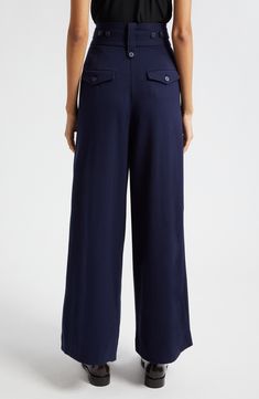 Pleated pants are cut with wideswept legs and plenty of pockets and button-tab details. 29" inseam; 27" leg opening; 15 1/2" front rise; 18" back rise (size 8) Zip fly with hook-and-bar closure Front slant pockets; back button-flap pockets Adjustable button side tabs Lined 63% polyester, 31% viscose, 6% spandex Dry clean Imported Formal Wide Leg Bottoms With Patch Pockets, Elegant Wide Leg Pants With Patch Pockets, Chic Full-length Pants With Patch Pockets, Formal Straight Leg Bottoms With Patch Pockets, Formal Spring Bottoms With Patch Pockets, Business Casual Full-length Wide Leg Pants With Welt Pockets, Casual Wide Leg Pants With Button Closure, Full Length, Chic Full Length Bottoms With Patch Pockets, Wide Leg Pants With Pockets For Formal Occasions