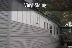 the side of a house that has been stripped off with vinyl siding on it's sides