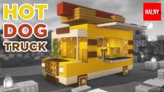 a small yellow building with the words hot dog truck on it