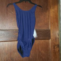 Dolfin Womens Lycra Swimsuit. Size 36. Navy Blue Color Dolfin Is The Leader In Competitive Swimwear. New With Tags. Fitted Blue One-piece Leotard, Blue Stretch Leotard For Swimming, Blue Stretch Leotard For Pool, Stretch Blue Leotard For Pool, Sleeveless Blue Leotard For Swimming, Fitted Blue Leotard For Pool, Blue Stretch Sleeveless Leotard, Blue Sleeveless Stretch Leotard, Blue Stretch Leotard For Beachwear