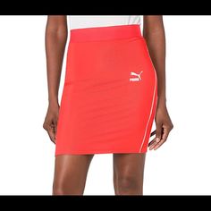 Elastic Waistband For A Comfortable Fit Contrasting Piping Details For A Flattering Look 86% Polyester, 14% Elastane. Color Pink Orange. Can Be Seen Through The Fabric. Casual Mini Skirt For Spring Sports, Spring Casual Mini Skirt For Sports, Red Sporty Skort For Sports, Sporty Red Skort For Sports, Casual Red Sports Skort, Red Casual Sports Skort, Red Casual Skort For Sports, Casual Red Skort For Sports, Sporty Red Skirt For Spring