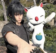 a person holding a stuffed animal in front of a cat and bear figure on a rocky surface