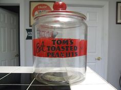 a glass jar sitting on top of a kitchen counter