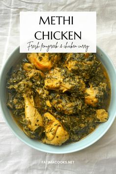 a bowl filled with chicken and spinach next to a sign that says methi chicken