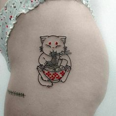 a woman's stomach with a tattoo of a cat holding a bowl of food