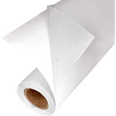 a roll of white paper on a white background