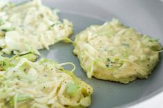 some food is sitting on a plate and ready to be cooked in the oven for consumption