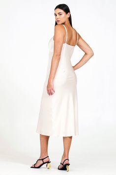 A twist on the satin slip dress, the Asher is slinky, strappy, and effortlessly chic. It floats along the body, coming to a shin-skimming hem. The simplicity of its silhouette allows the draped front detailing to shine. Sleek Satin Slip Dress With Satin Finish, Chic A-line Satin Slip Dress, Luxury Satin A-line Slip Dress, Solid Satin Slip Dress, Midi Length, Satin V-neck Slip Dress With Ruched Detail, Dress Date, Dress Date Night, Satin Slip, Satin Slip Dress