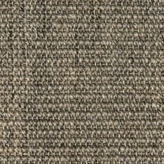 a close up view of the texture of a tweed fabric with no pattern on it