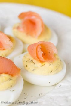 deviled eggs with smoked salmon on them