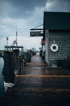 a dock with boats docked in the water