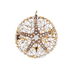 Finely detailed antique Edwardian era pendant or brooch (circa 1910s) crafted in 14 karat yellow gold.  Old mine cut diamond is estimated at 0.20 carats (estimated at J-K colour and I1 clarity), accented with 25 1mm to 2mm seed pearls.   The pendant features openwork scrolled design topped with white enamel. The curves and arches capture the feminine and intricate beauty of the Edwardian era. The star motif is set with a diamond to the centre and seed pearls to the outer points. The versatile pi Wedding Ring Guard, Masonic Jewelry, Russian Jewelry, Old Mine Cut Diamond, Platinum Wedding Band, Art Nouveau Jewelry, Diamond Star, Edwardian Era, Victorian Jewelry