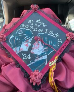 a decorated graduation cap sitting in the back of a car