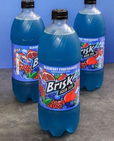 three bottles of blueberry pomegranate soda